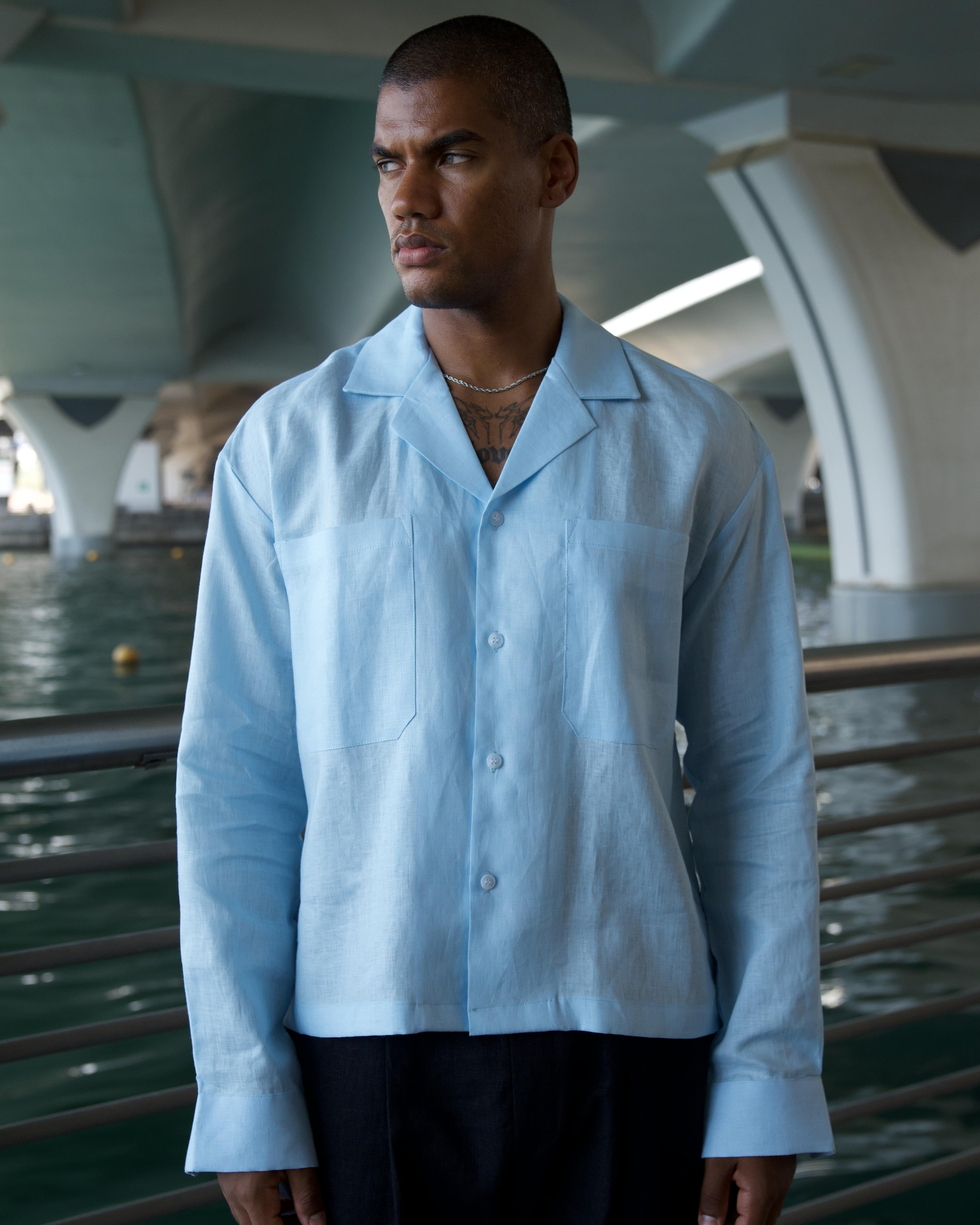 Model wearing the pale blue Box Linen Shirt, cropped boxy fit