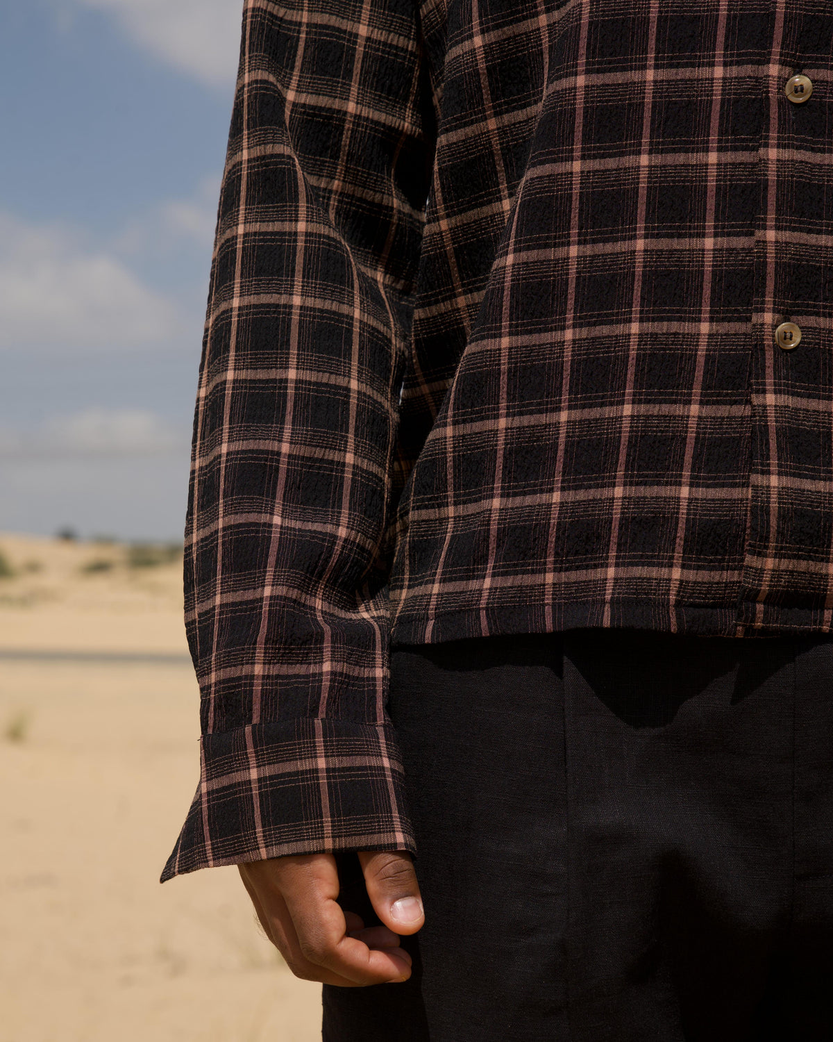 Japanese viscose seersucker check fabric detail in brown