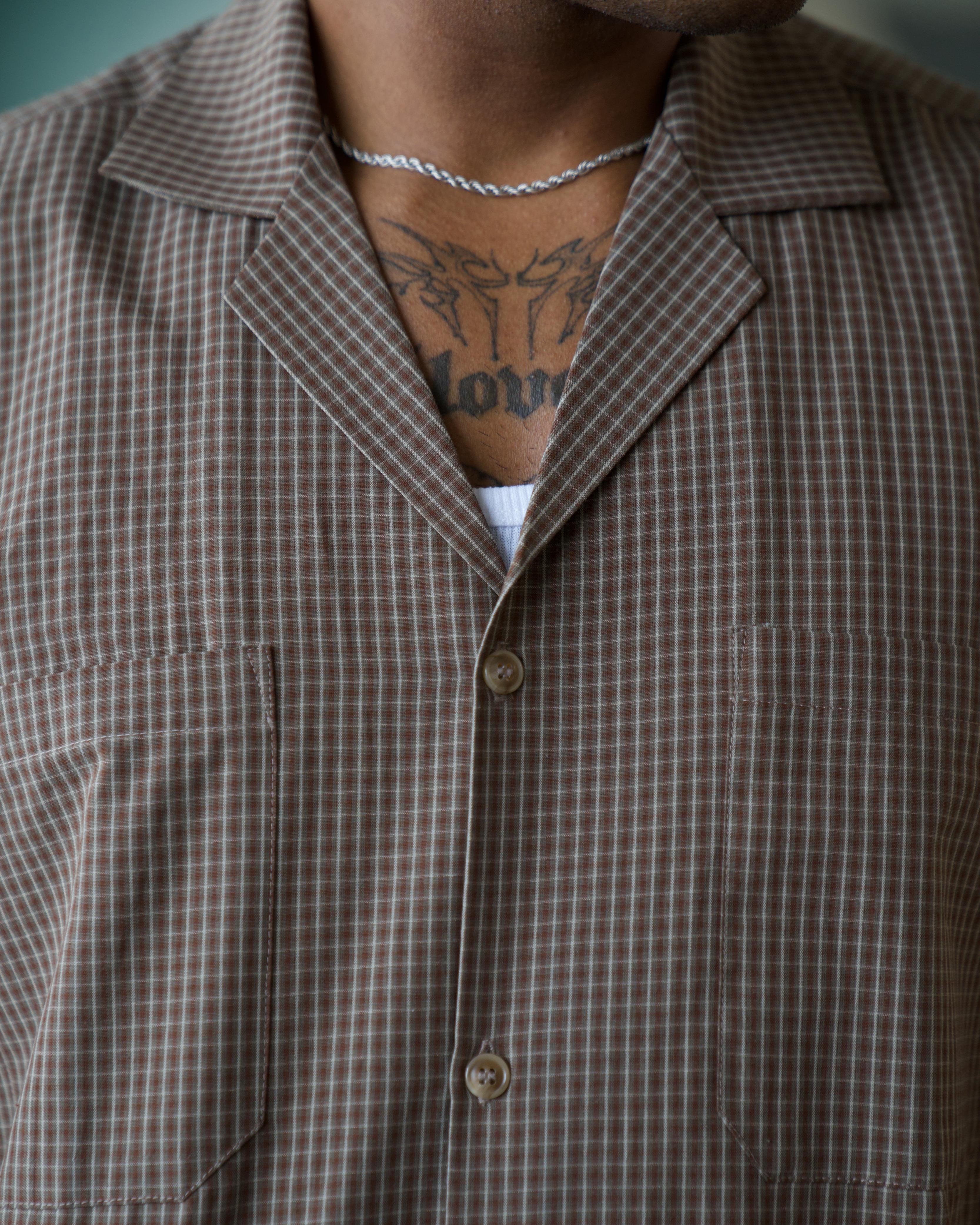 Brown check cotton shirt with cuban collar and double breast pockets