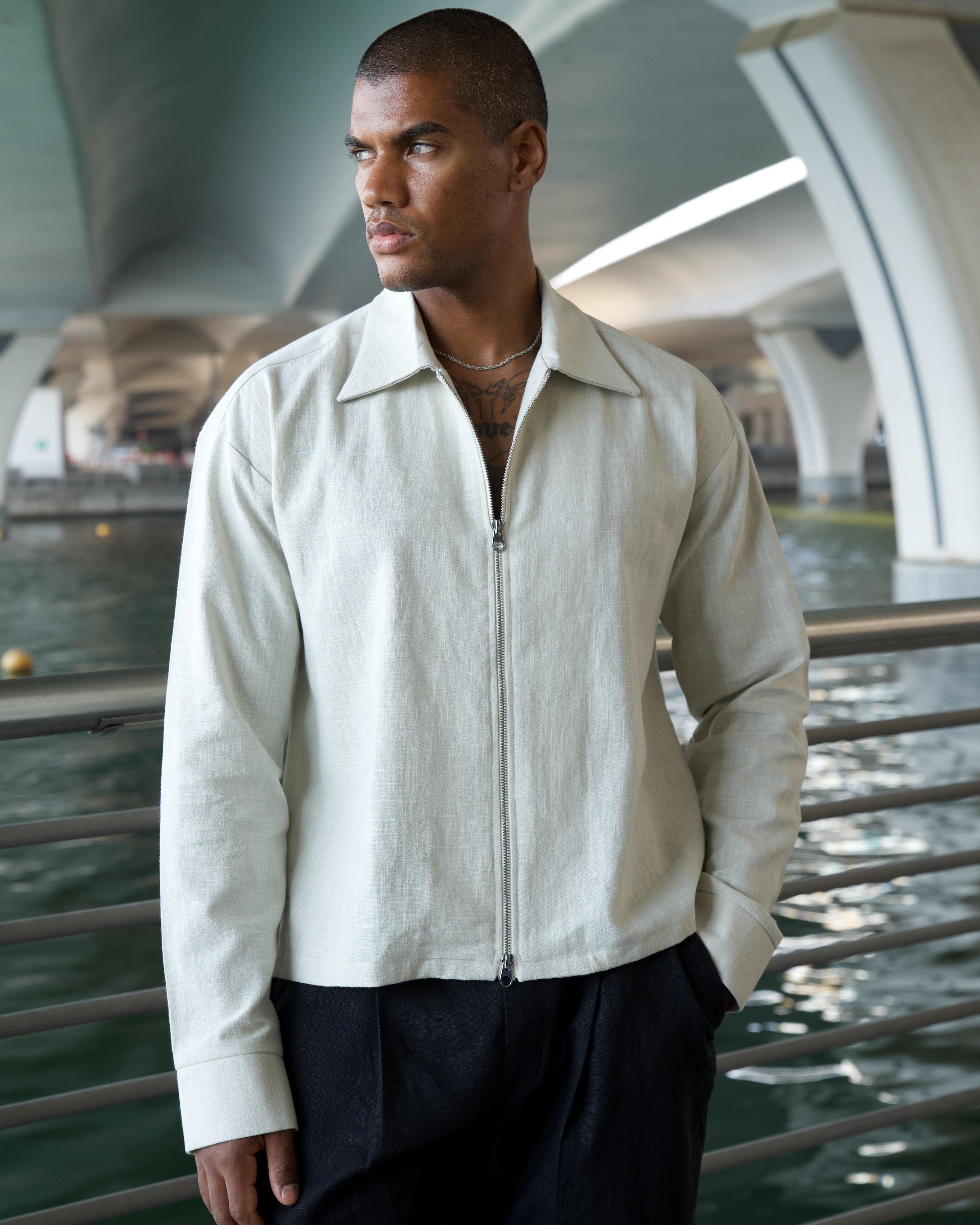 Model wearing the cream Linen Zip Overshirt, cropped fit