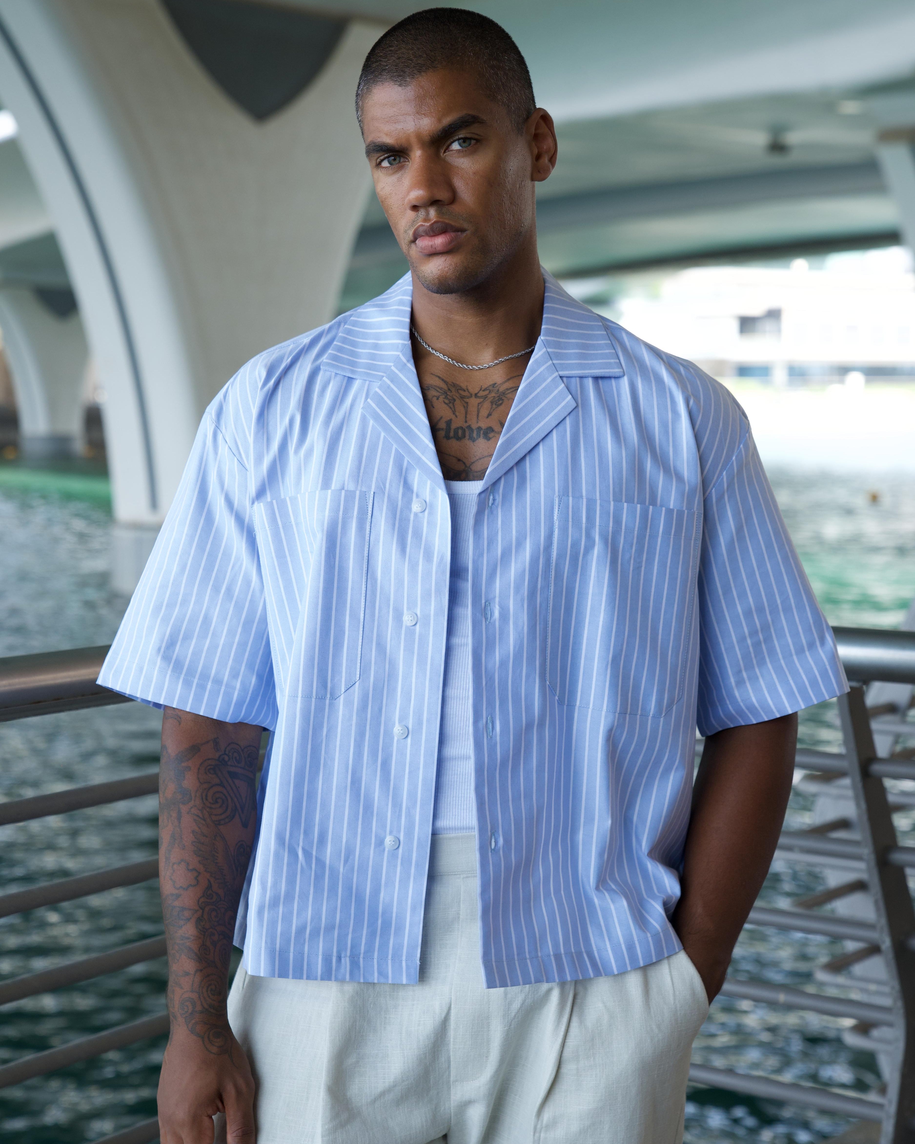 Model wearing the pale blue Oxford Pinstripe Shirt, boxy fit