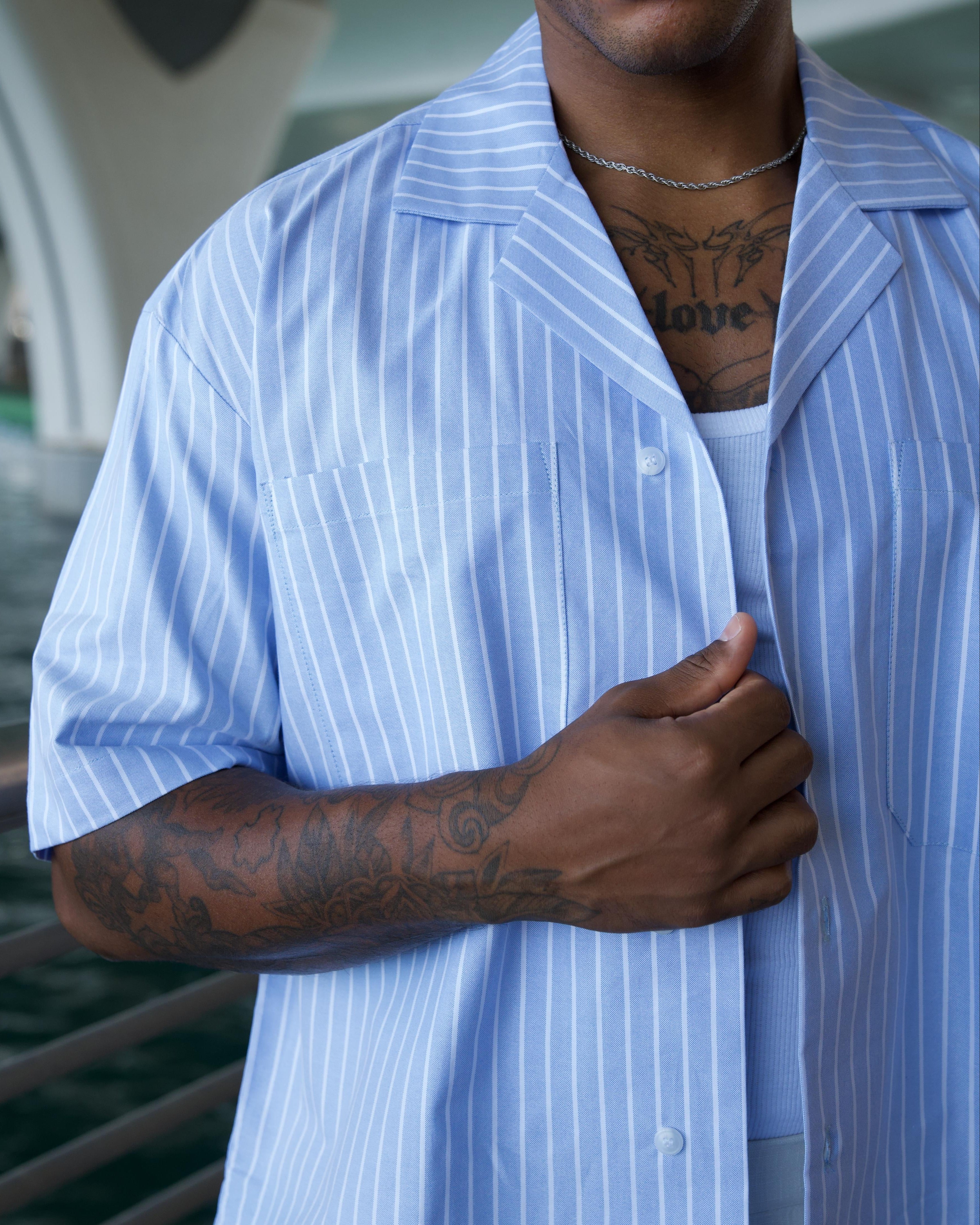 Side view of the Oxford Pinstripe Shirt in pale blue
