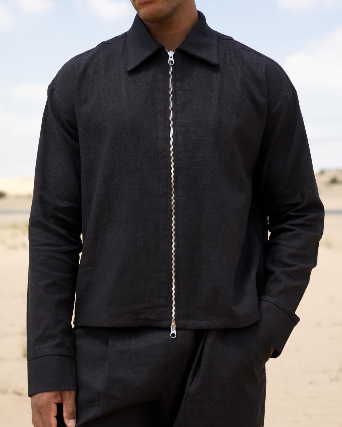 Overlap cuff detail on the black Zip Overshirt